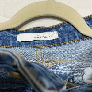 Distressed leopard patch jeans